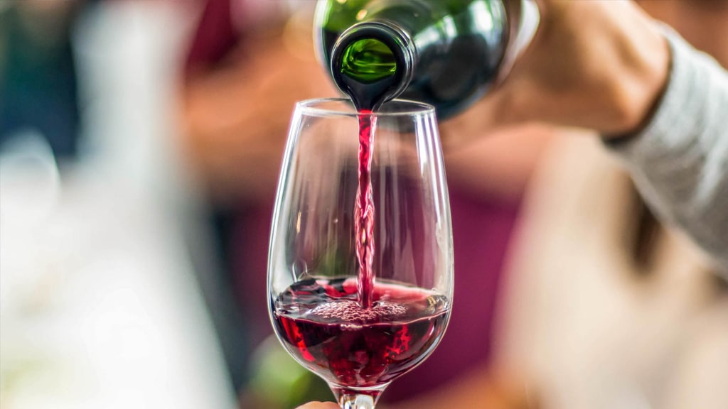 Pouring Red Wine Caple Wine Coolers